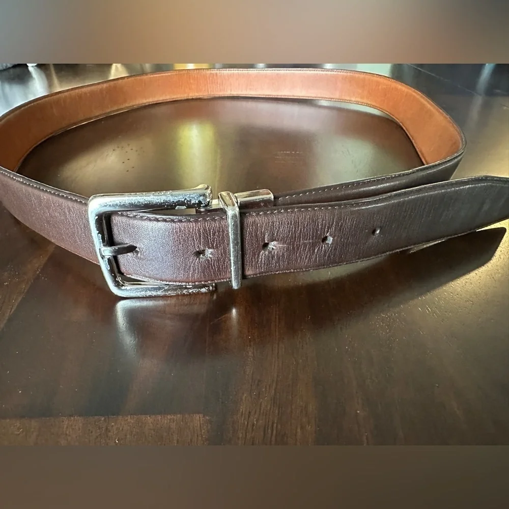 Cole Haan reversible belt. Size 42 silver buckle. Brown & dark brown